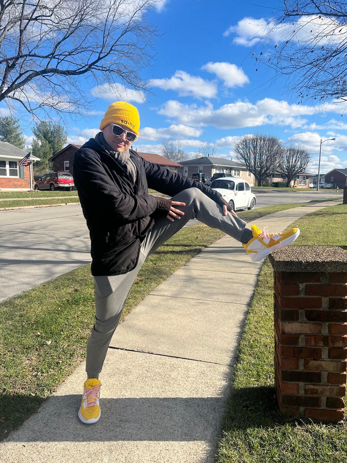 Me wearing yellow prize sneakers